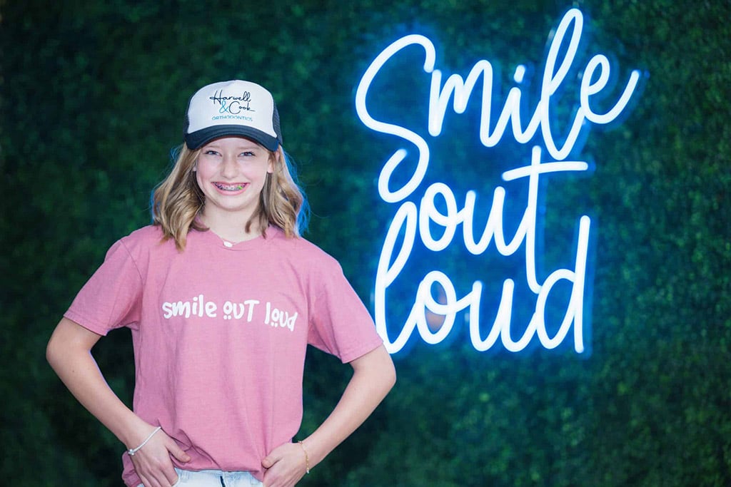teen girl with braces smiling
