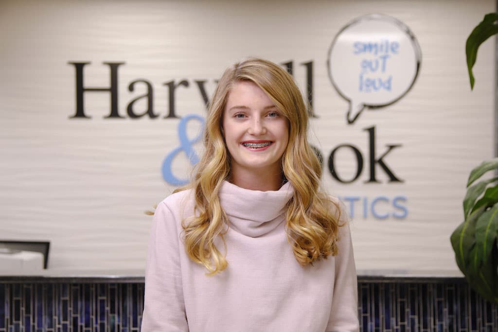 Teen girl smiling with braces
