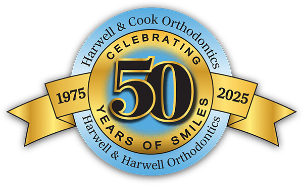 Harwell & Cook 50 Years of Smiles anniversary logo | Harwell & Cook Orthodontics